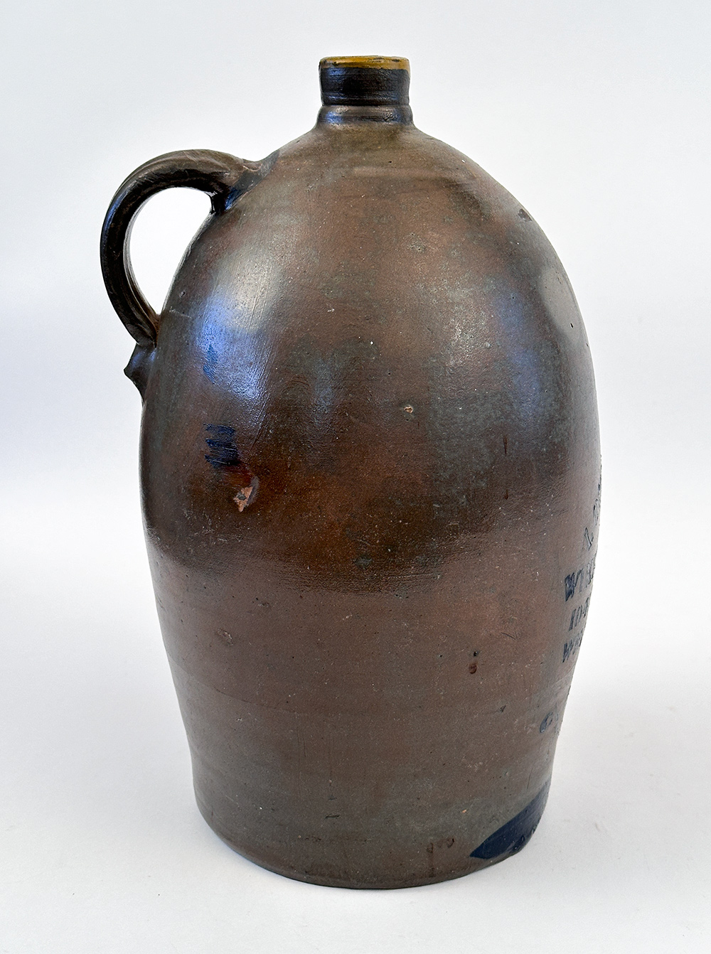 wheeling west virginia blue decorated stoneware merchant jug
