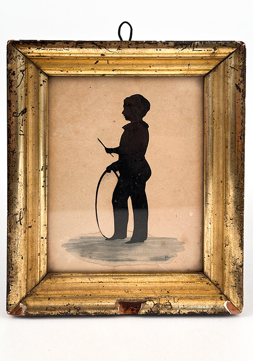 1840s antique boy with hoop toy hollow cut silhouette in lemon gold frame for sale