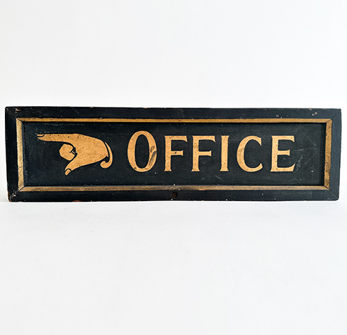 antique black and gold office wooden trade sign with gold pointing fingered hand on black with frame