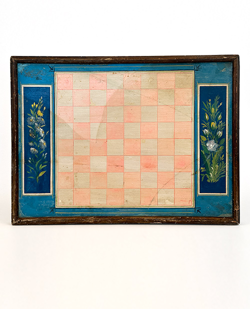 19th century antique paint decorated wooden checkers gameboard in unusual colors of blue, pink and white
